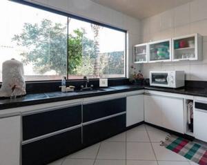 Casa 4 quartos 3 banheiros 265m²